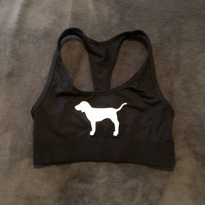 Pink VS. black sports bra